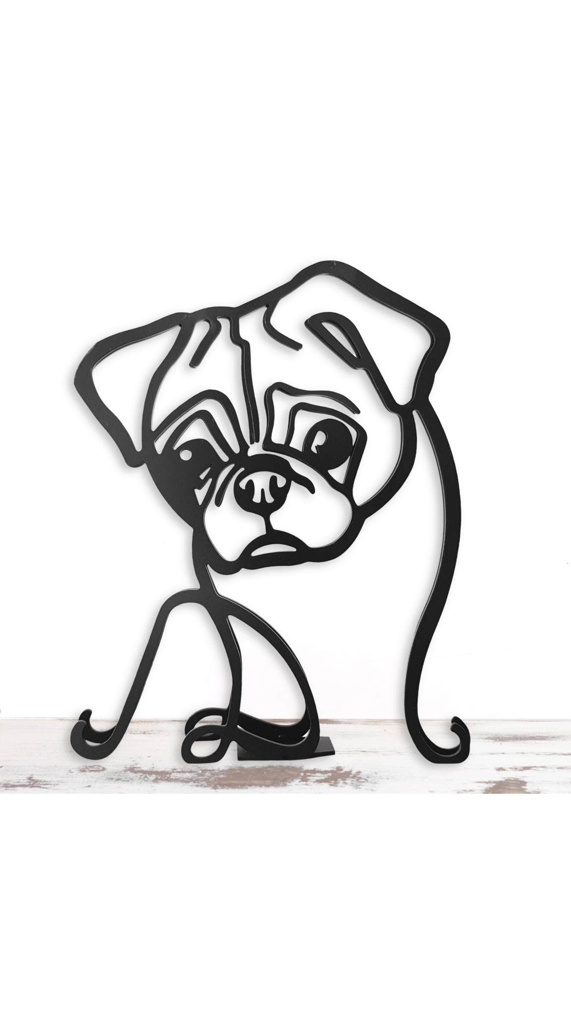 Doggo Zone Store Facebook ad: Minimalist black metal dog statues, designed in a…