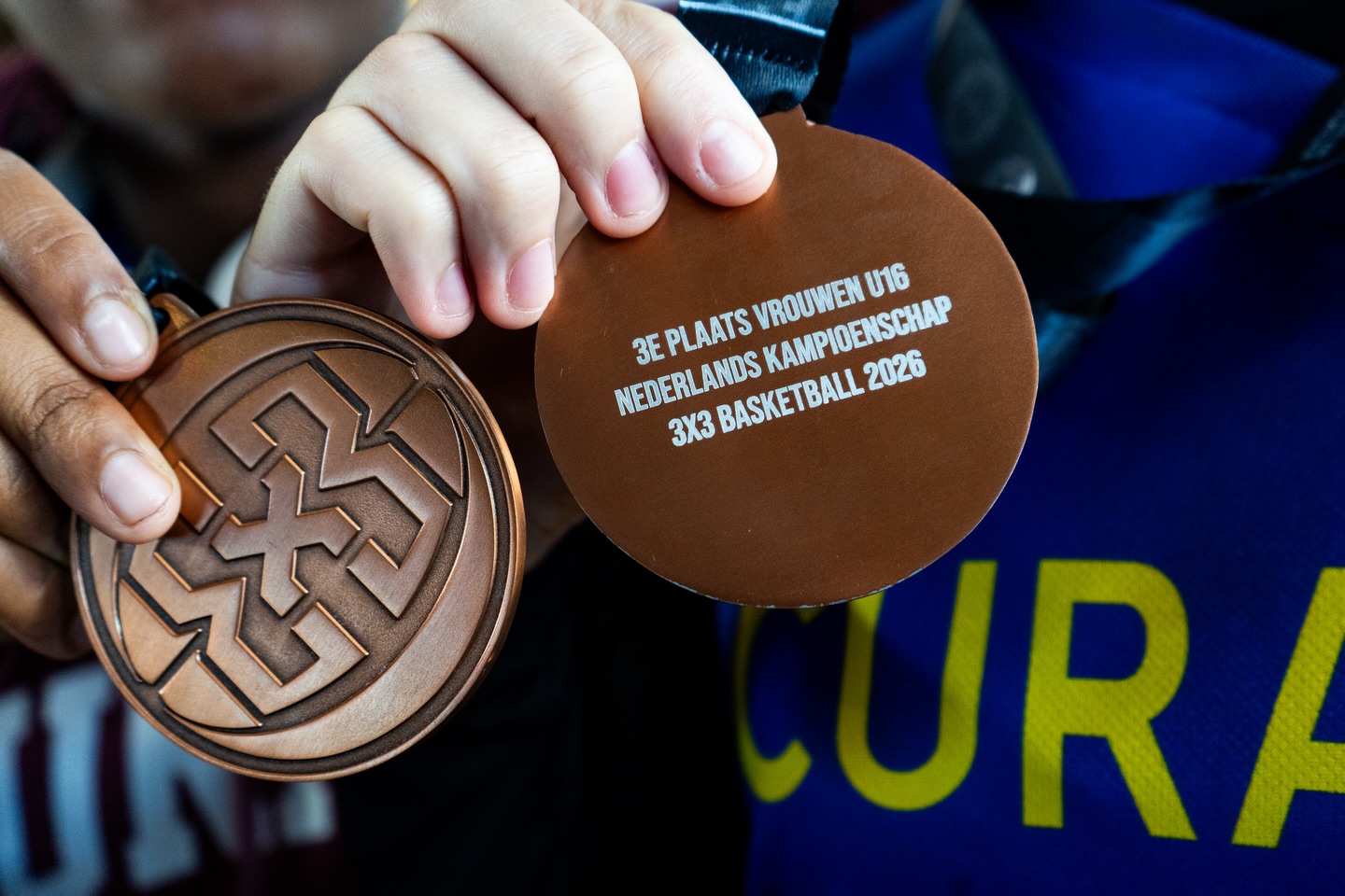 Girls Basketball League Curaçao Facebook ad: Bronze is coming home with our U16!