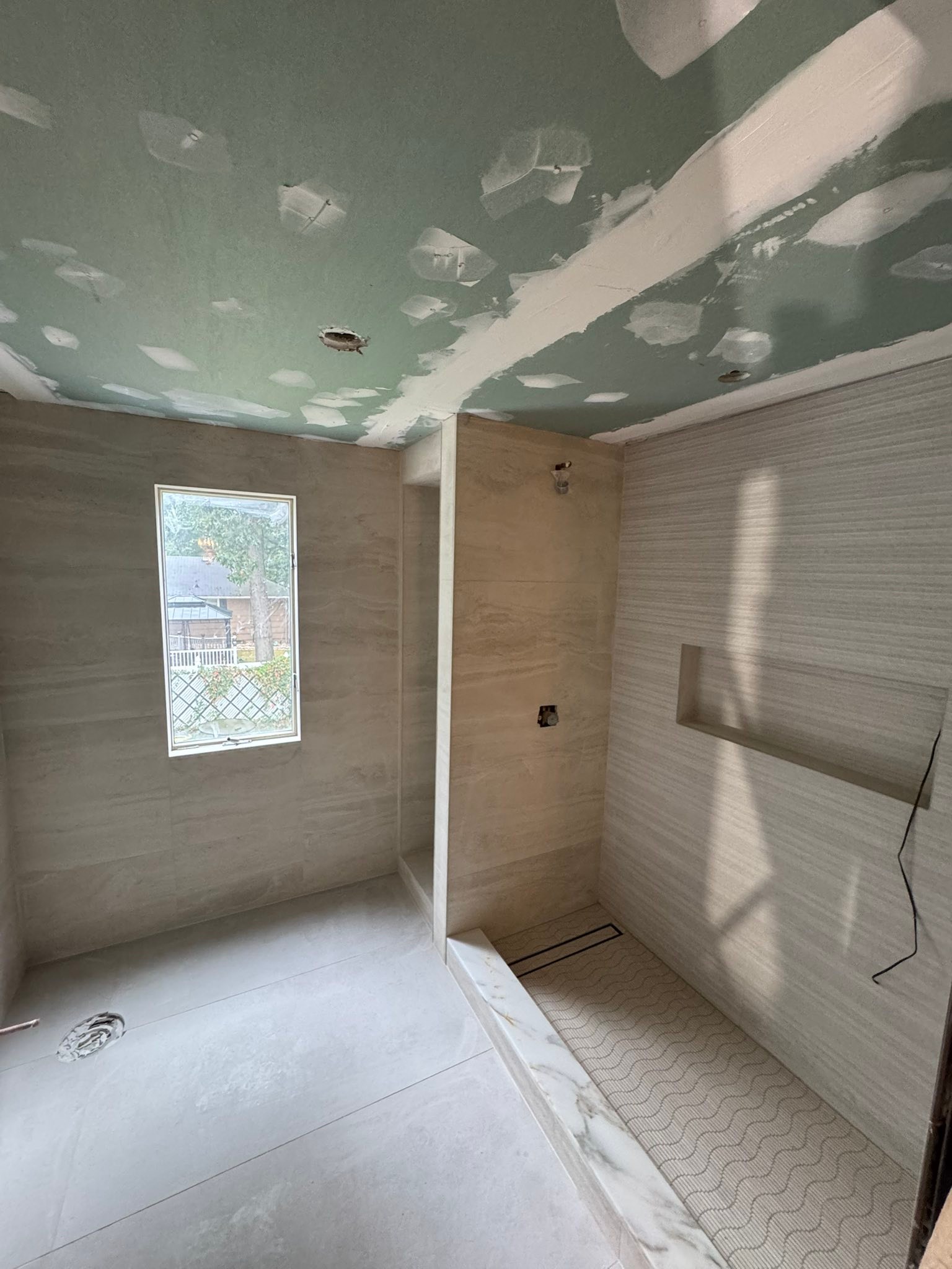 John Tile Installer Facebook ad: Looking for professional tile installation?