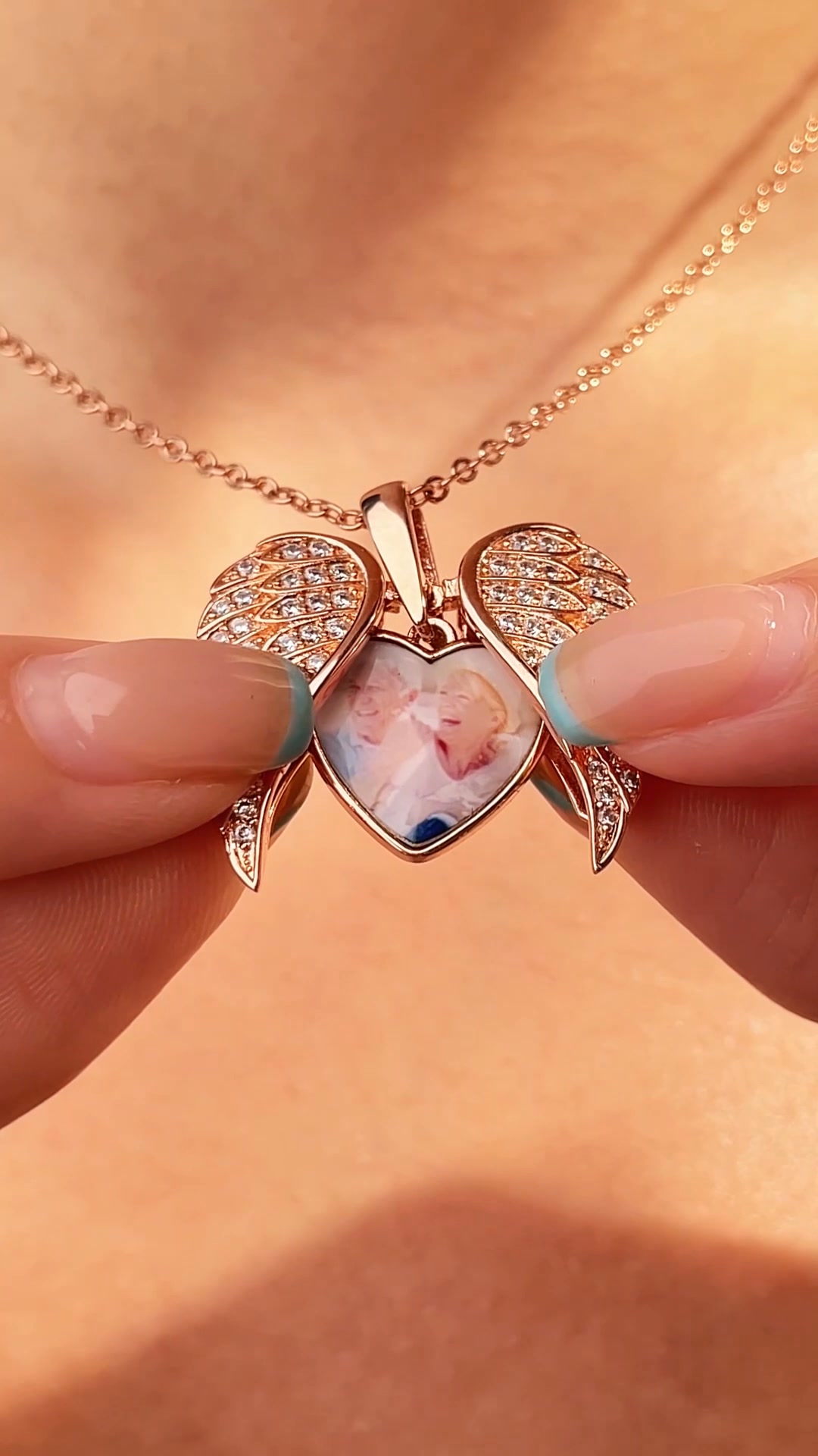 Insgifts Facebook ad: Custom CZ Heart Shape Angel Wing Necklace with Photo…