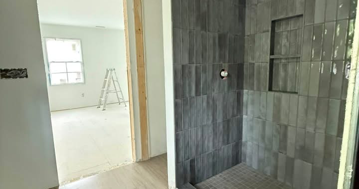 HandyProman Facebook ad: Need a Reliable Tile & Handyman Professional?