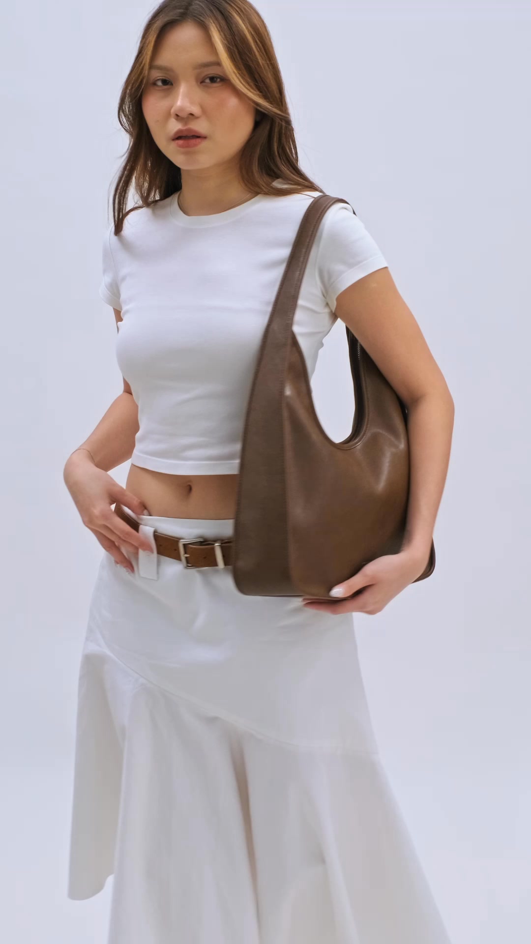 Christy Ng Indonesia. Facebook ad: Soft Structure. Effortless Luxury.