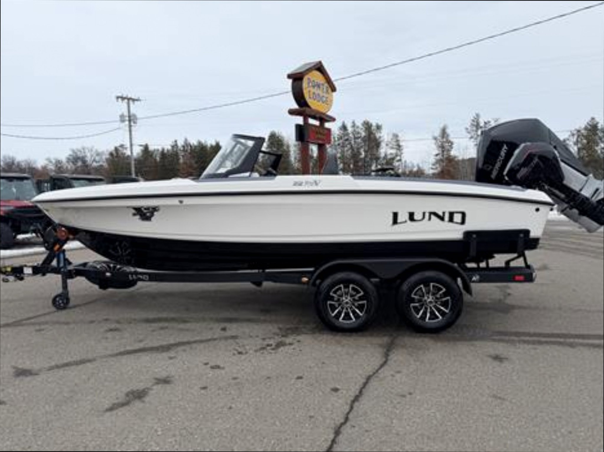 Power Lodge Facebook ad: 2026 LUND 202 PRO V GL XS **FREE $1000 SIMMS FISHING GEAR**
