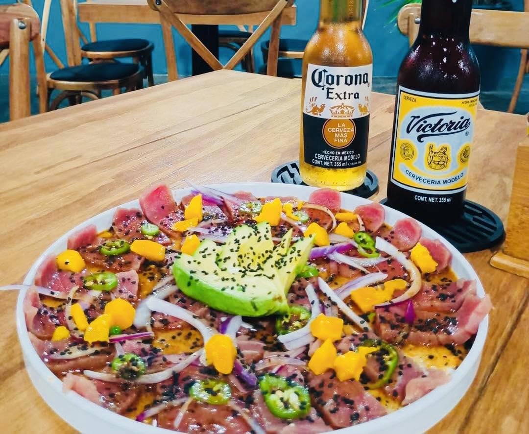 La Mermeja Facebook ad: Una marisquería llena de sabor en Huatulco!