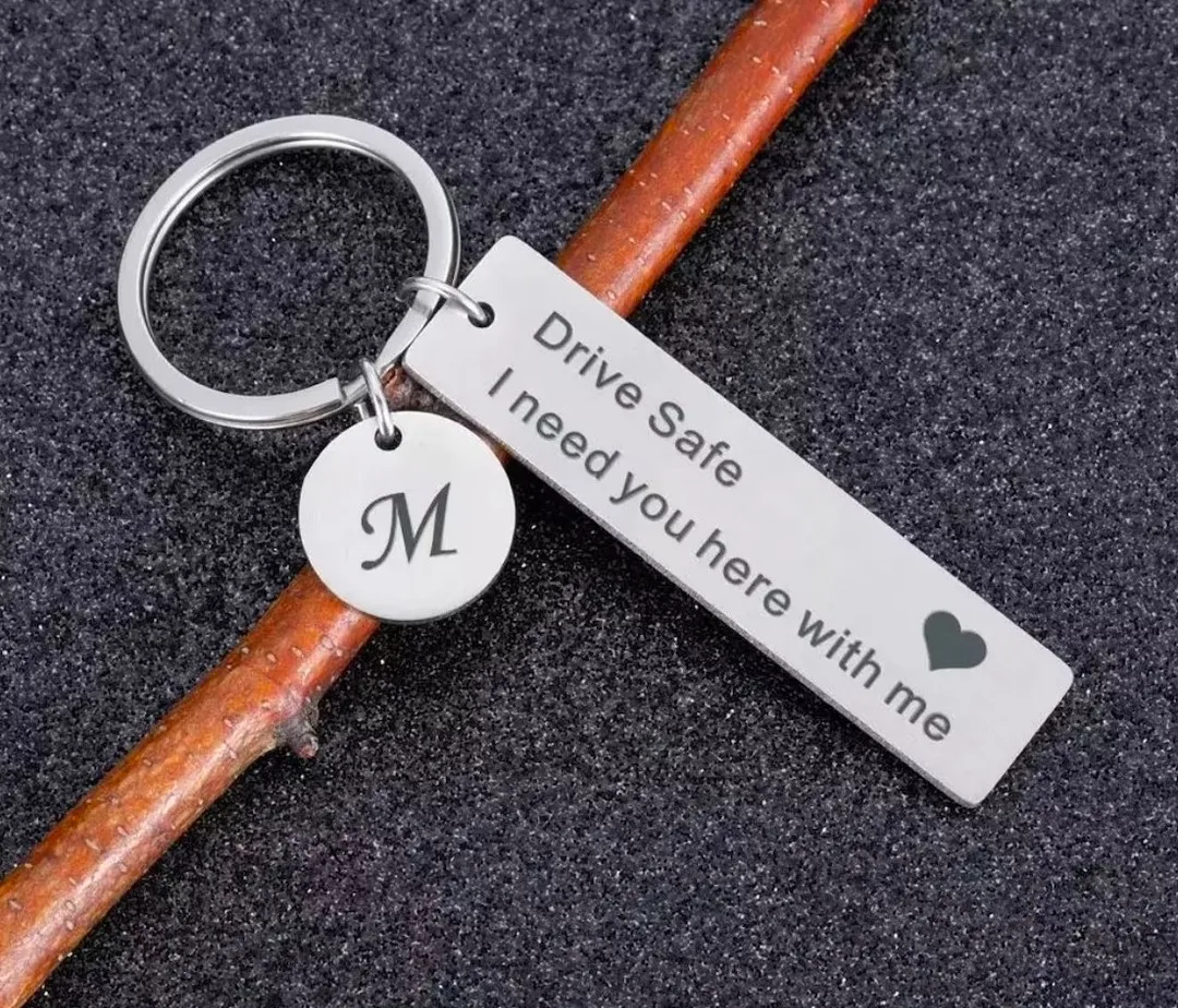 The Elegant Beauty Facebook ad: Personalize key Chain on Matt Finish Steel Metal…
