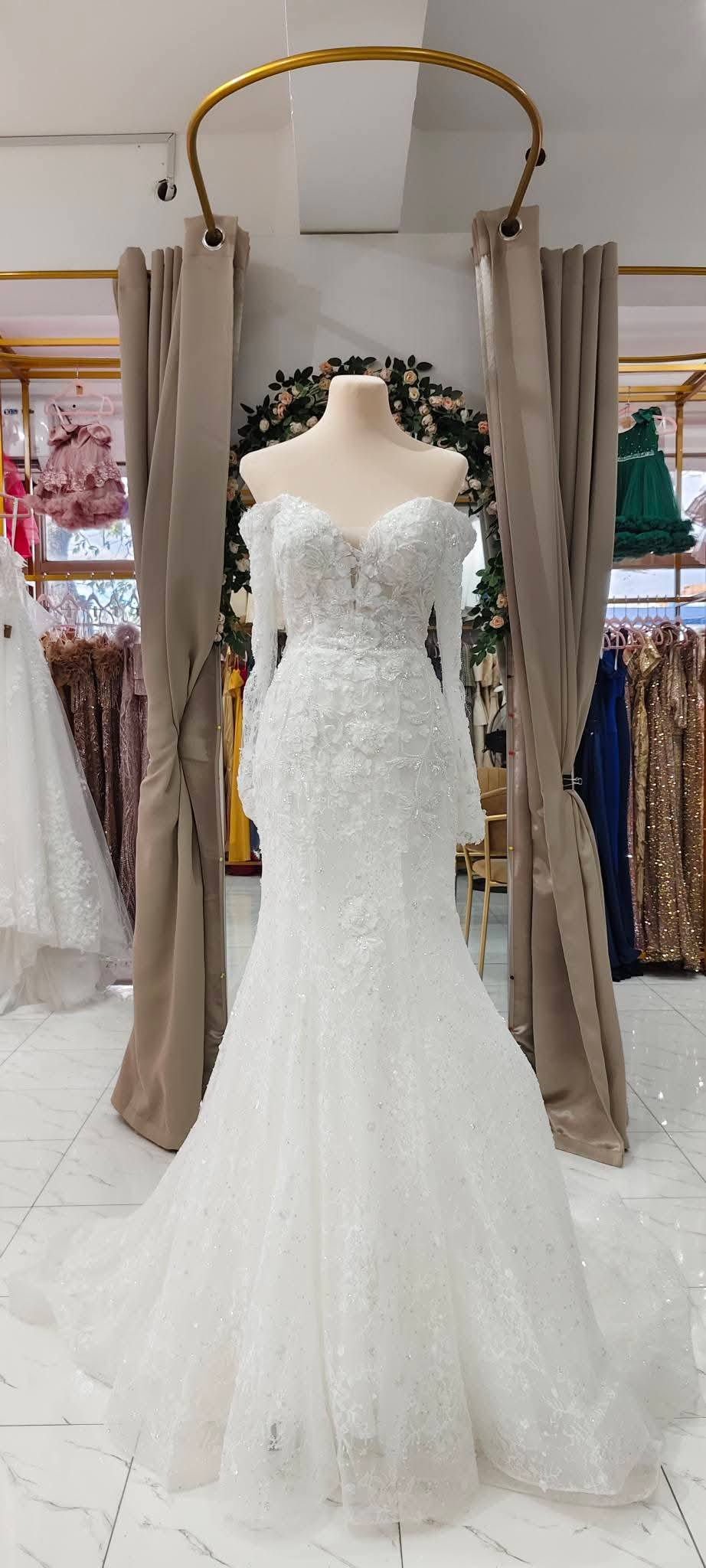 Francisco Sayson Gown and Suit Rental Facebook ad: Dream Wedding on a Budget?