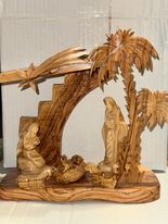 Nativity Olive Wood Facebook ad: handmade olive wood souviners made by the christians…