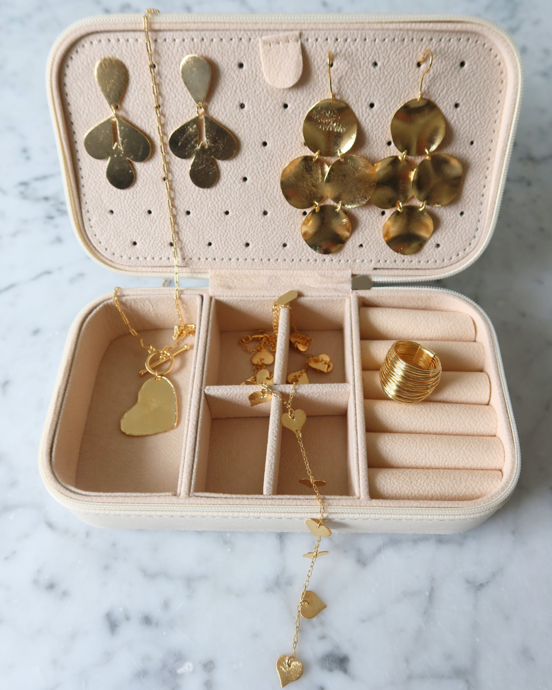 Marcia Moran Facebook ad: No look is complete without jewelry.