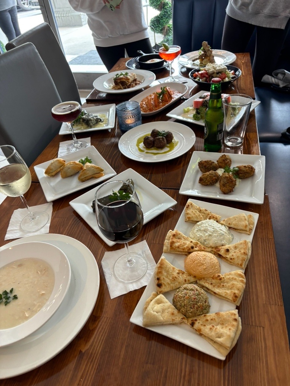 Yassou Greek Facebook ad: Updated Menus! Added several exciting new items across…
