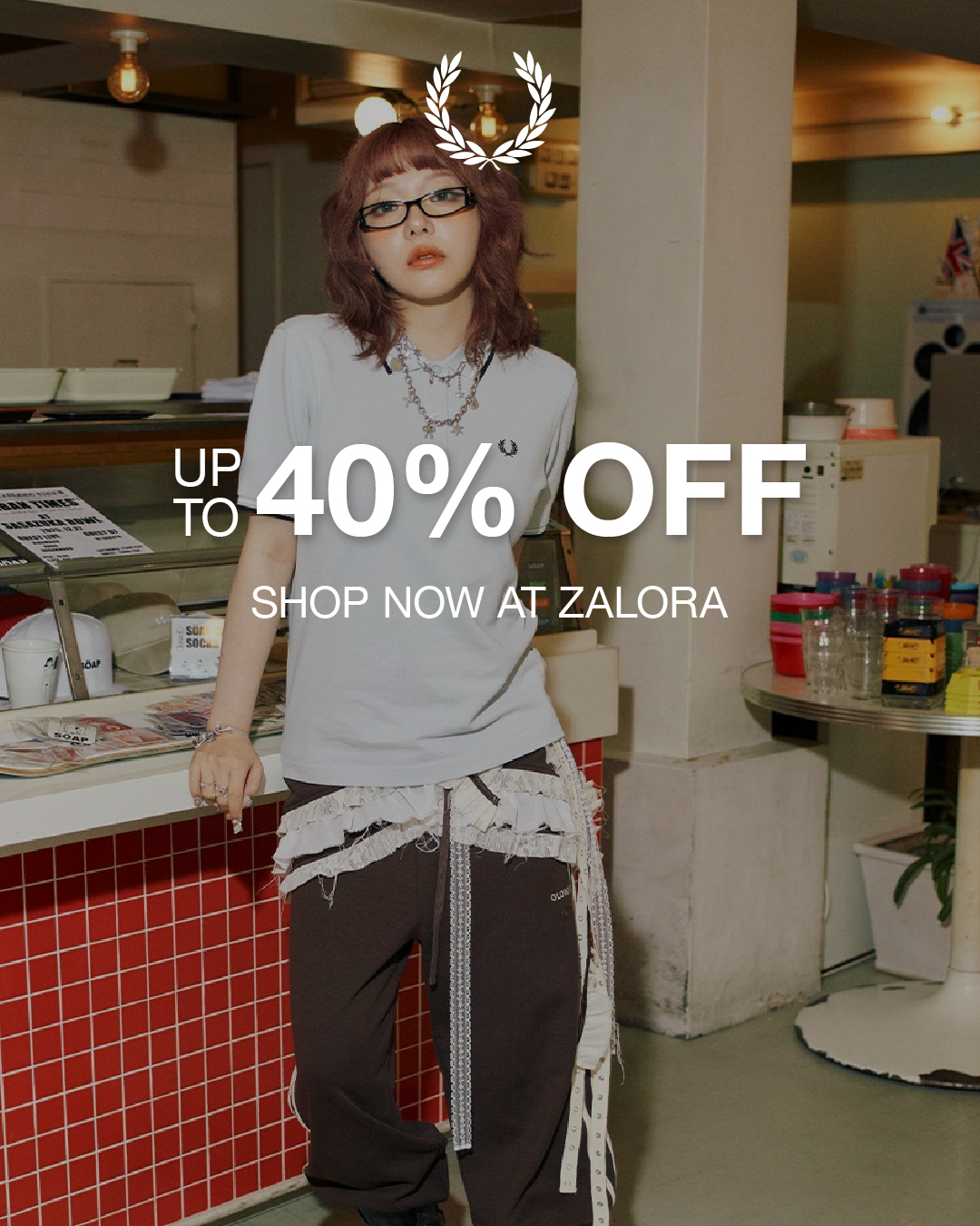 fredperrysg Facebook ad: Your Fred Perry favourites are just a click…