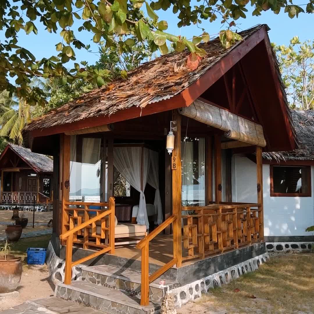 Gangga Island Resort & Gangga Divers Facebook ad: Built under shady palm trees, surrounded by white…