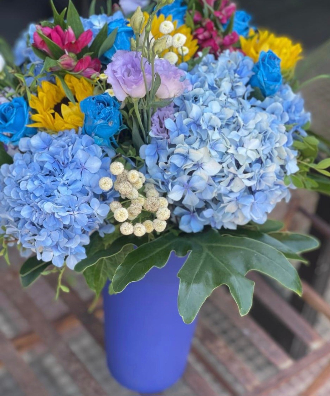 Saoud Flowers Facebook ad: Elegant Blue Bouquet for Every Occasion
