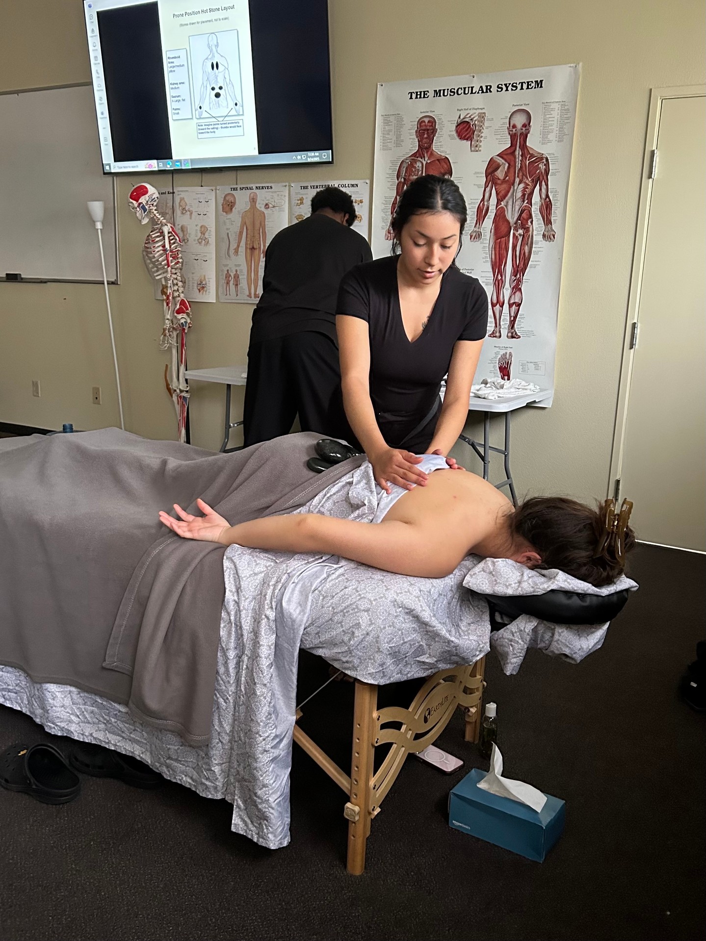 National Holistic Institute⎜A College of Massage Therapy Facebook ad from May 8, 2026