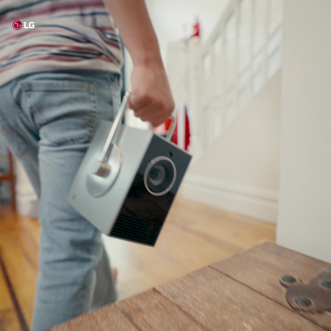 LG Global Facebook ad: Tiny projector. Epic 4K cinema.