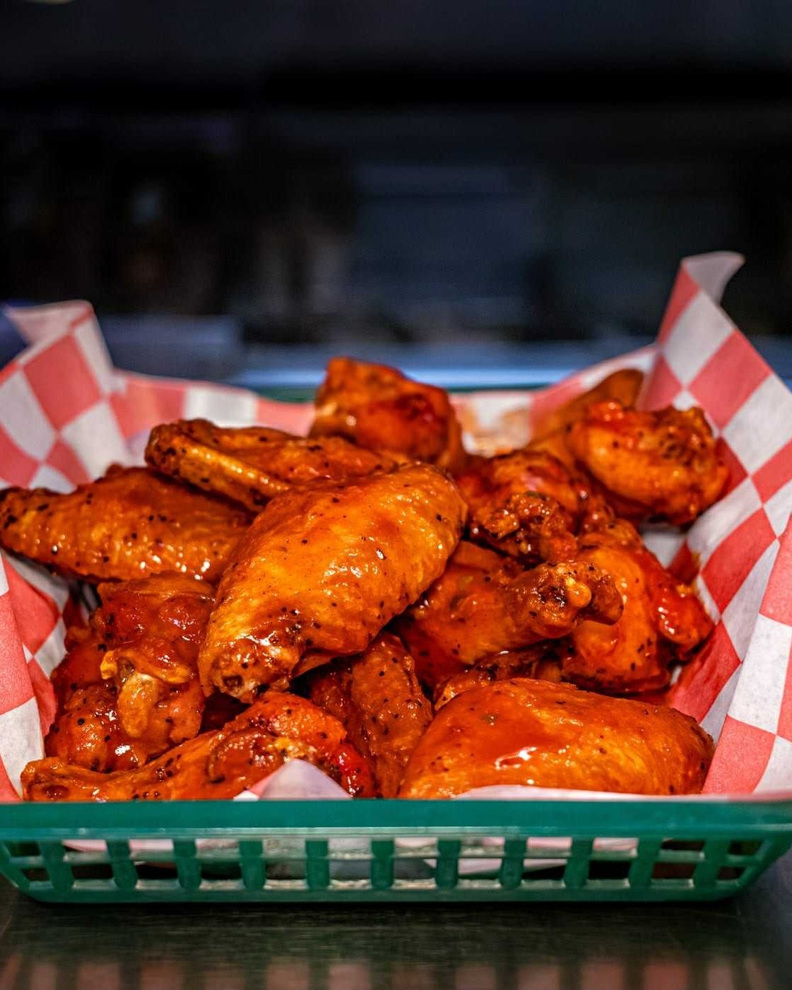 Rookies Craft Burger Bar Facebook ad: Tuesday in house food specials: Wings, Flat Bread…