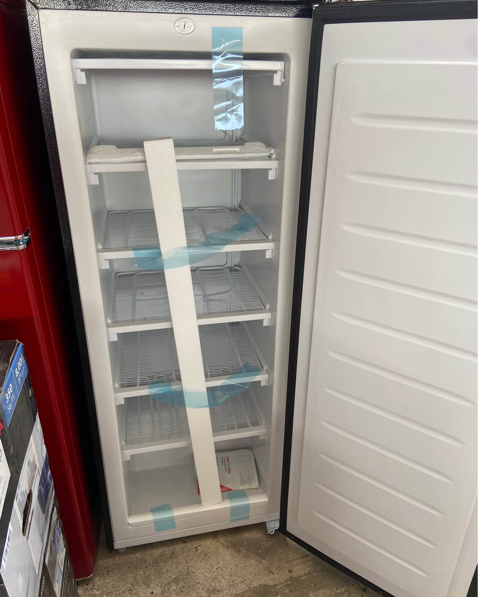 Kelly Glez Facebook ad: Frigidaire 6.5 cu. ft. Upright Freezer, Platinum